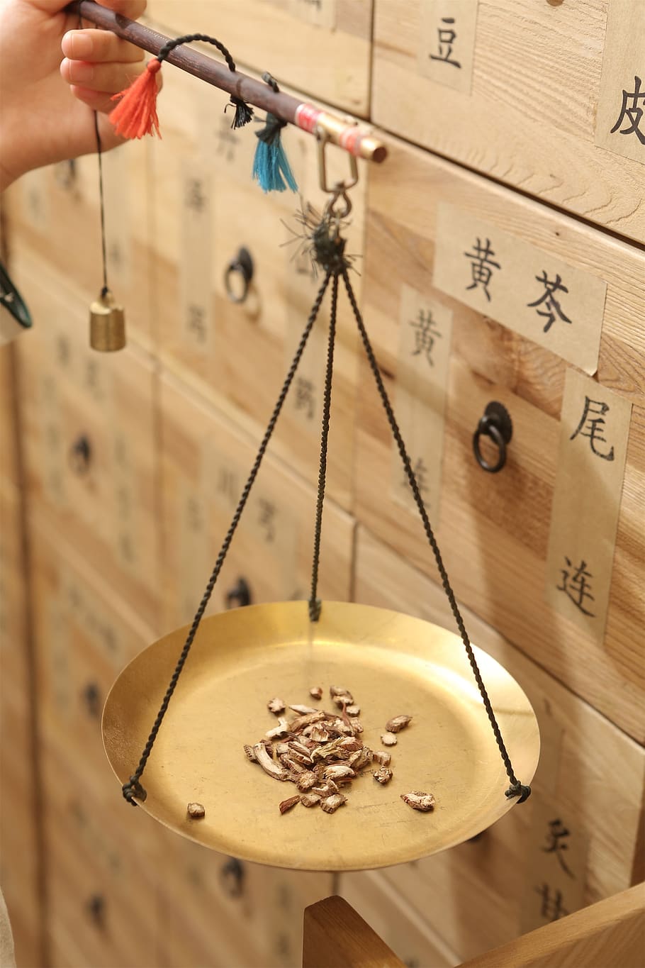 A traditional Chinese medicine scale. 
Photo via Pixabay. 